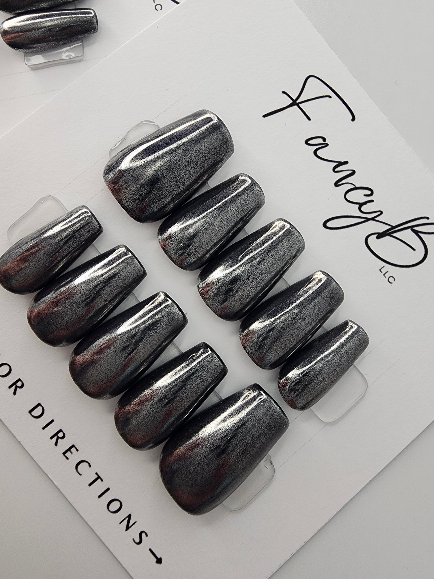gunmetal silver chrome stick on nails in short coffin shape, reusable press on nails