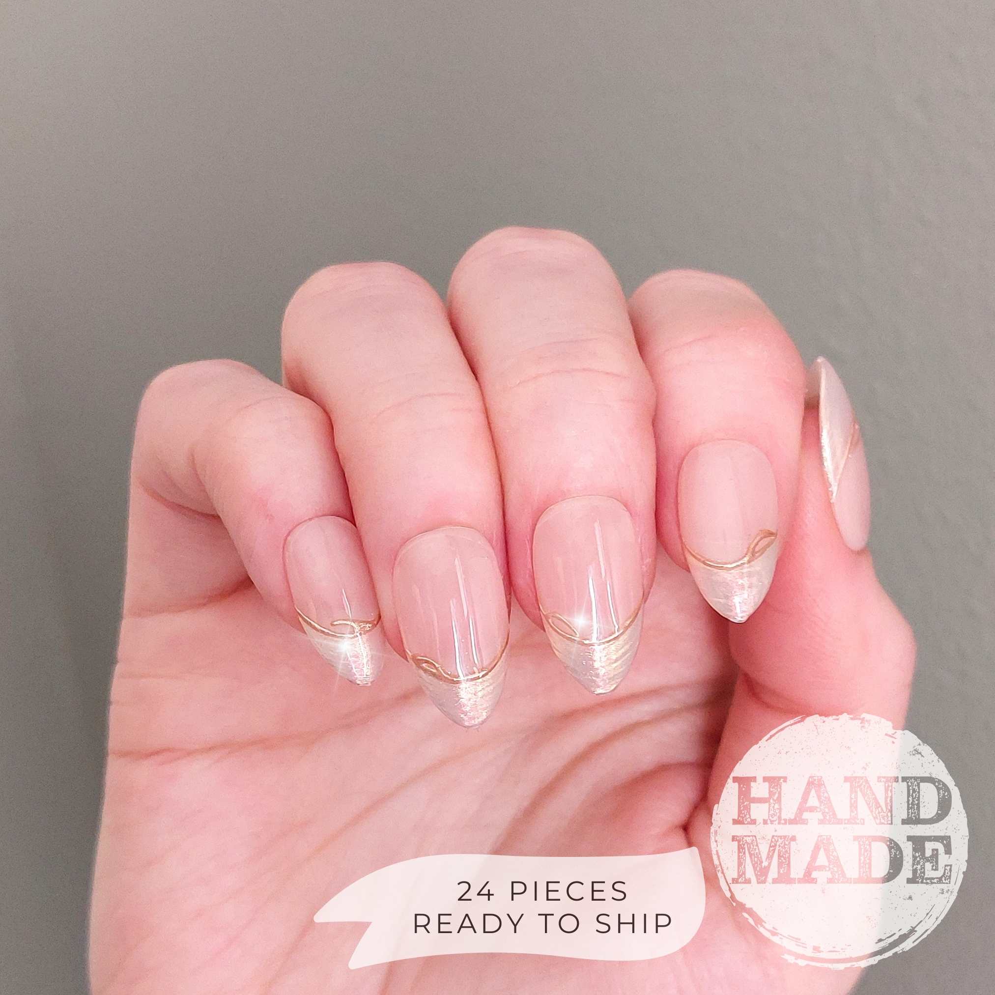 Pearlescent French Tip Press on Nails with Gold Line on Nude base color, short almond. Handmade press on nails from FancyB Nails.