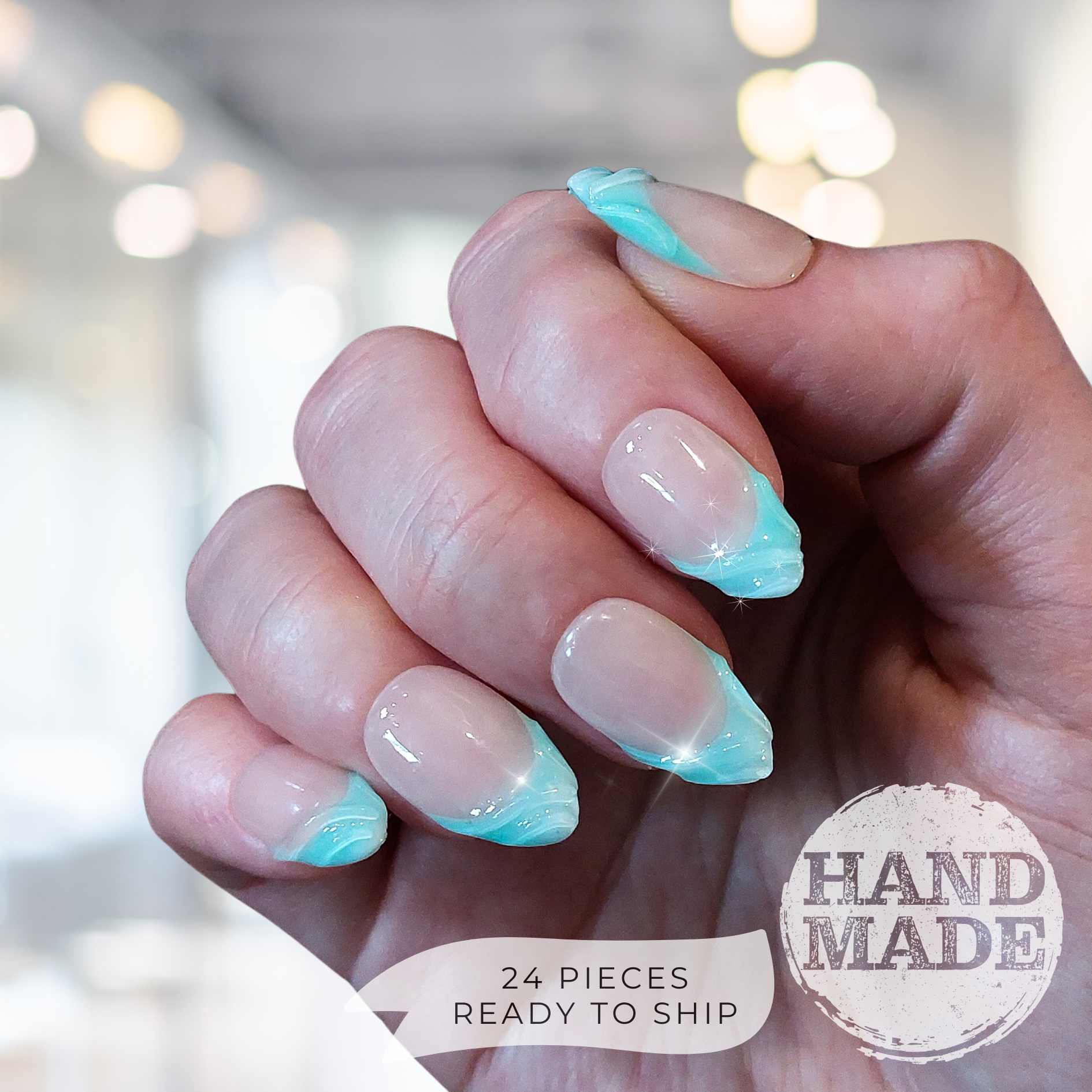 Cyan french tips with 3d swirls, bright mint blue french tip press on nails. Handmade reusable press on nails from FancyB Nails show in short almond.