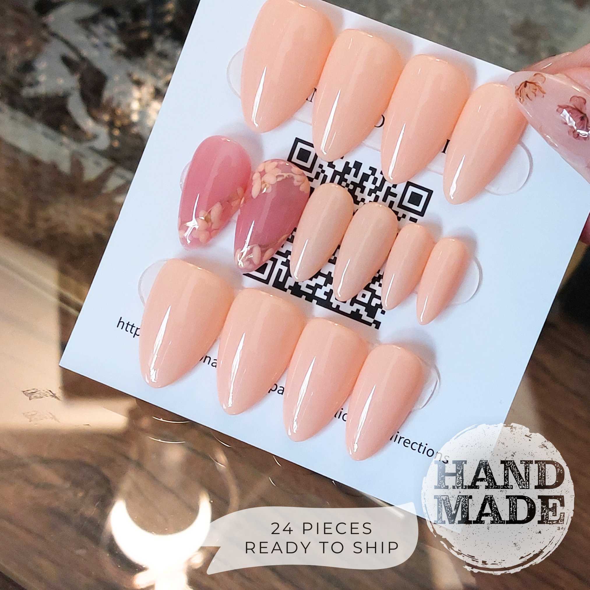 Peach and pink flower nails, springy floral press on nails with gold details, 24 piece reusable nails. Handmade FancyB Nails in Medium Almond.