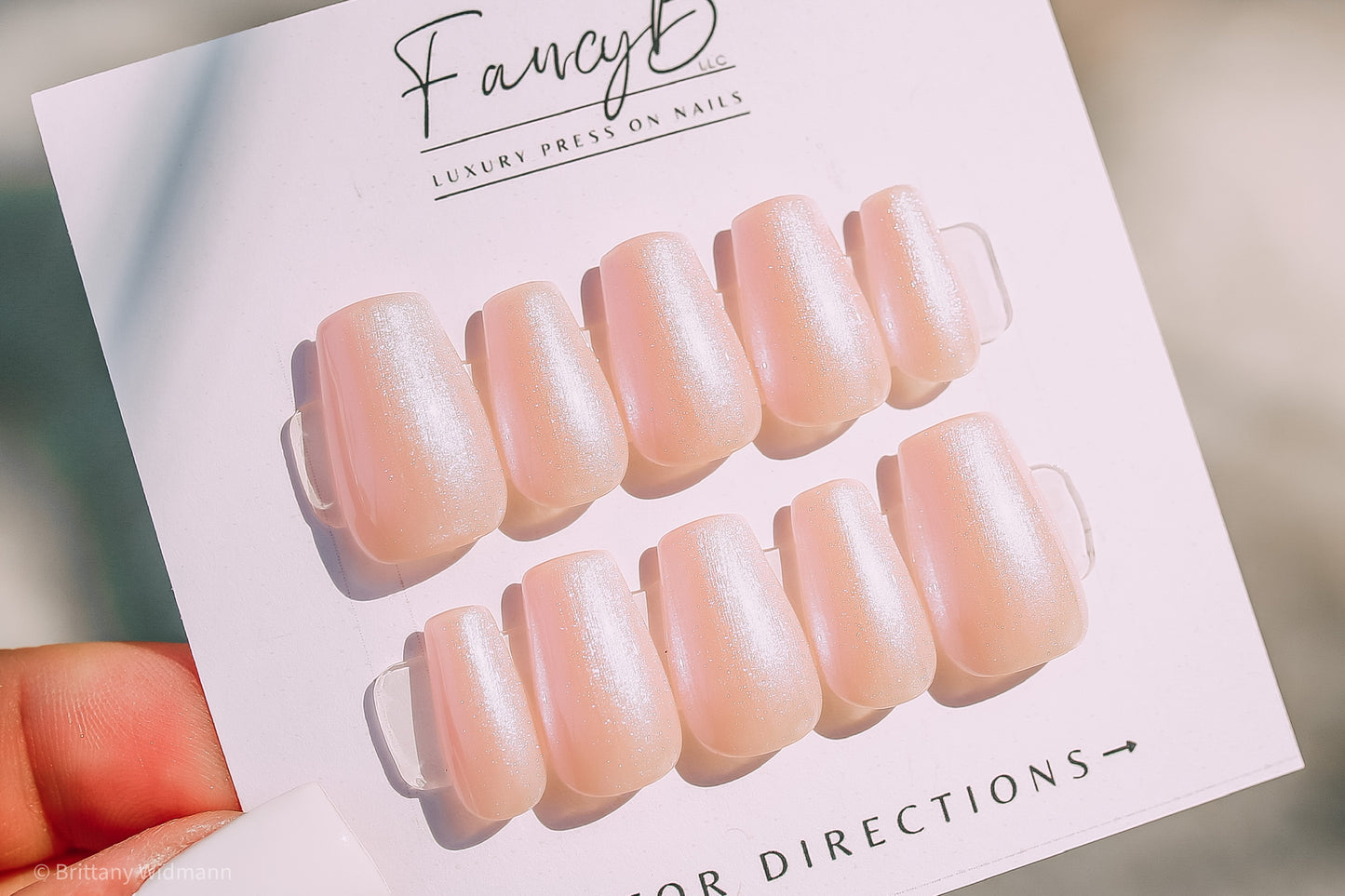 Hailey Beiber Pink Neochrome Pearlescent Glazed Donut Press on Nails in Short Coffin, Medium Coffin Brittany Widmann Photography