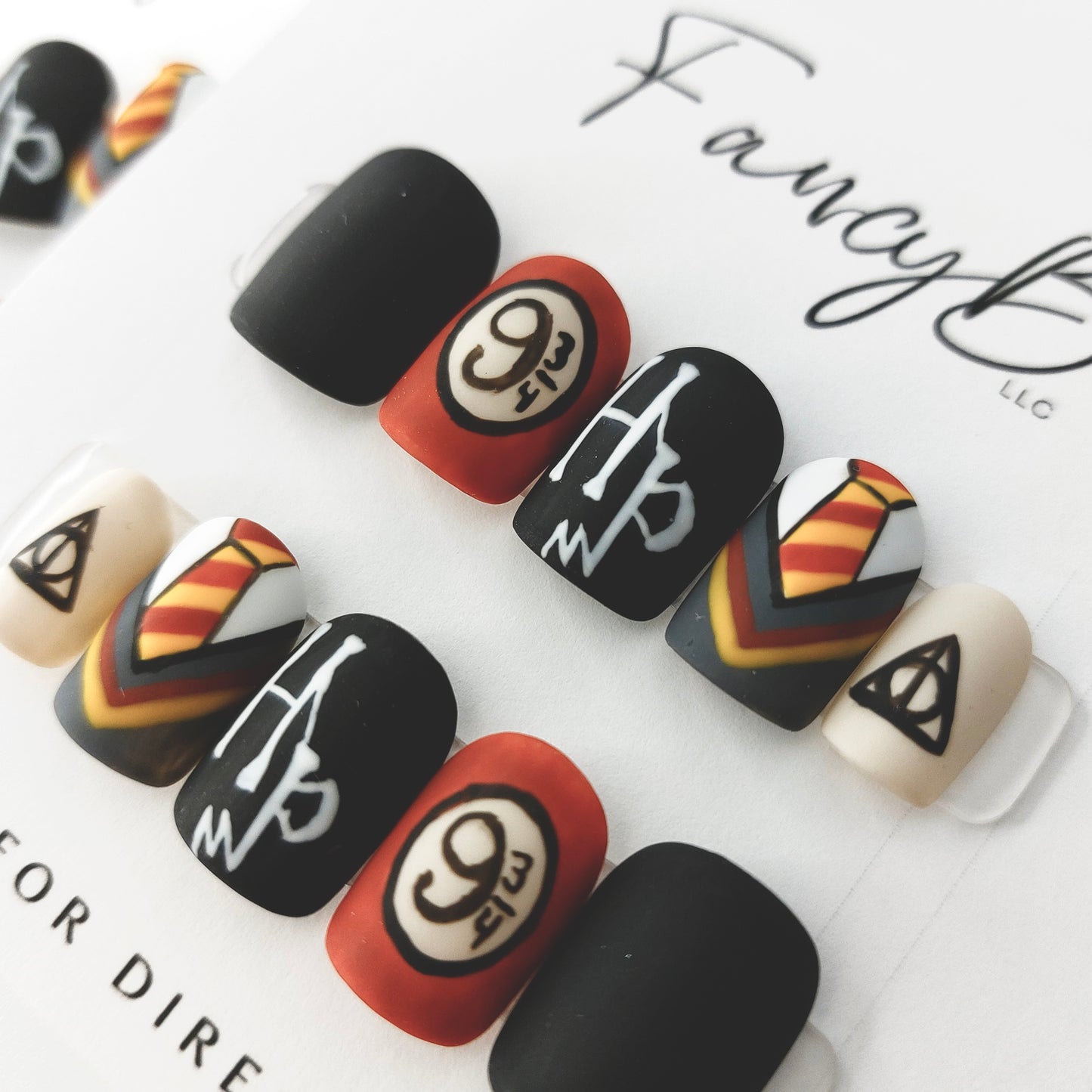 Custom press on nails. Harry Potter theme press on nails in matte finish on short squoval shape. reusable handmade stick on nails.