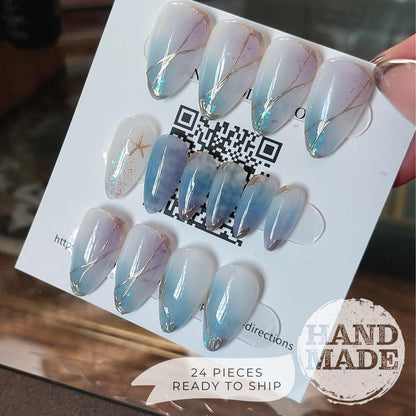 24 piece press on nails set. Sea glass ocean nails with starfish, handmade ocean mermaid theme nails from fancyb nails. Medium almond press on nails.