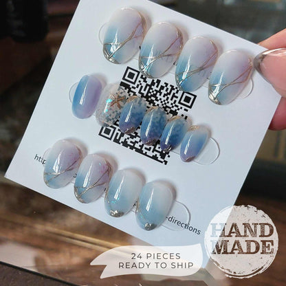 24 piece press on nail set, backside. Sea glass ocean nails with starfish, handmade ocean mermaid theme nails from fancyb nails. Short oval press on nails.