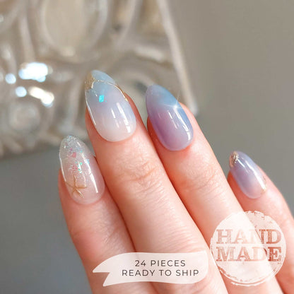 Sea glass ocean nails with starfish, handmade ocean mermaid theme nails from fancyb nails. Short almond press on nails.