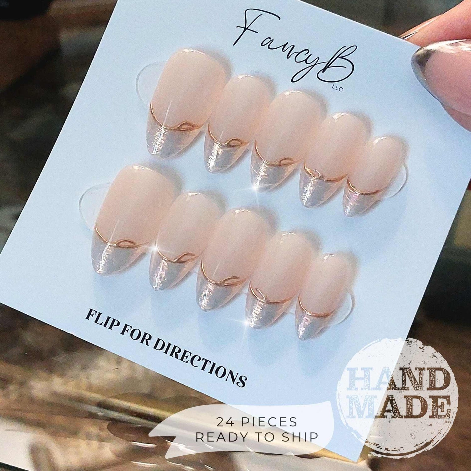 Pearlescent French Tip Press on Nails with Gold Line on Nude base color, medium almond. Handmade press on nails from FancyB Nails.