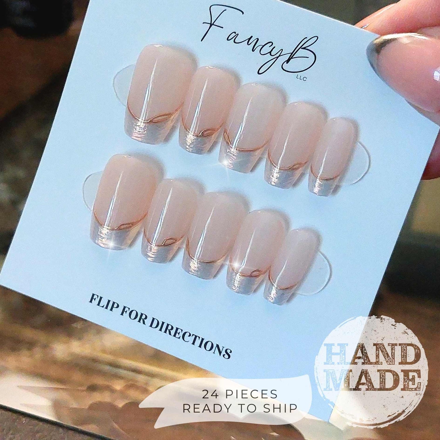 Pearlescent French Tip Press on Nails with Gold Line on Nude base color, short coffin. Handmade press on nails from FancyB Nails.