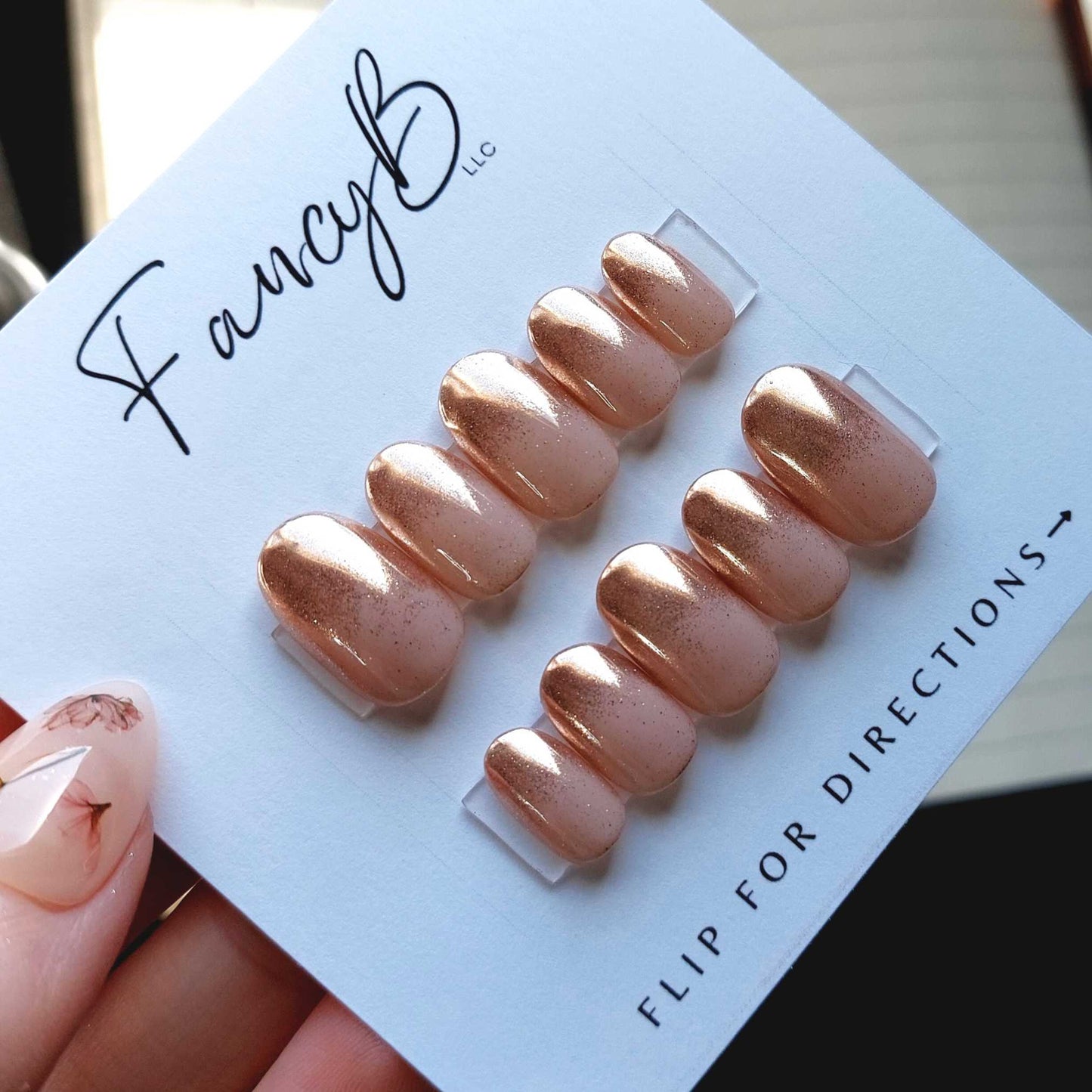 Rose gold chrome ombre nails in short oval