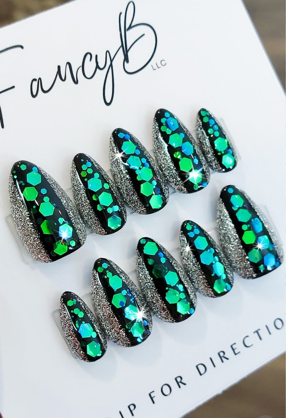 Custom glitter press on nails with teal blue and green chunky glitter with silver glitter on sides on short almond press on nails.