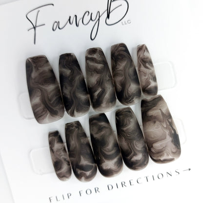 smoky black swirl nails in matte finish medium coffin ballerina shape, swirly smoke design press on nails.