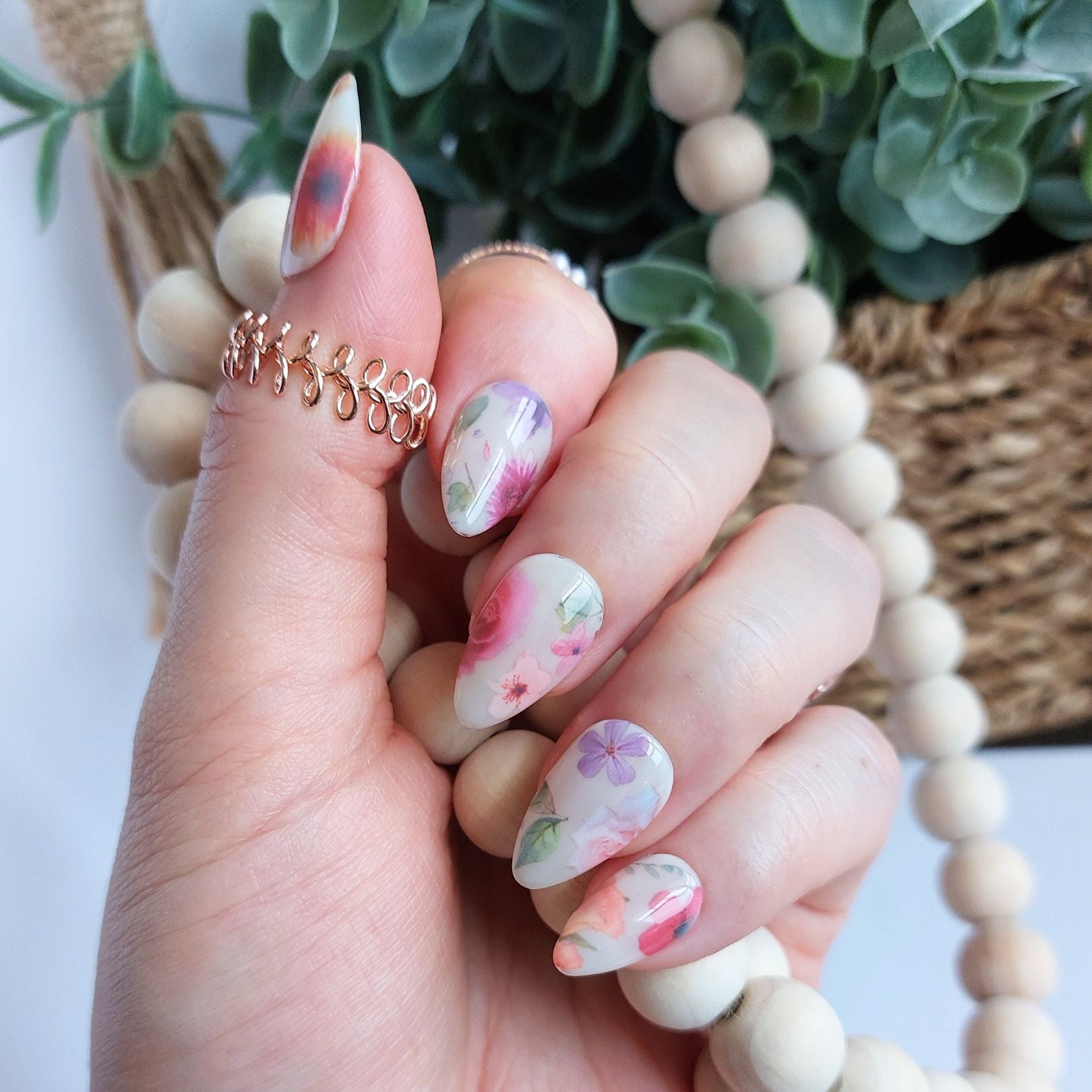 milk bath press on nails with colorful flowers and milky white color on short almond nails from fancyb press on nails