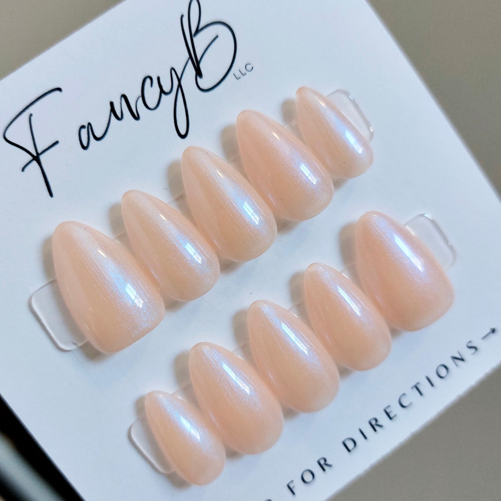 Hailey Beiber Pink Neochrome Pearlescent Glazed Donut Press on Nails in Short Almond, Medium Almond