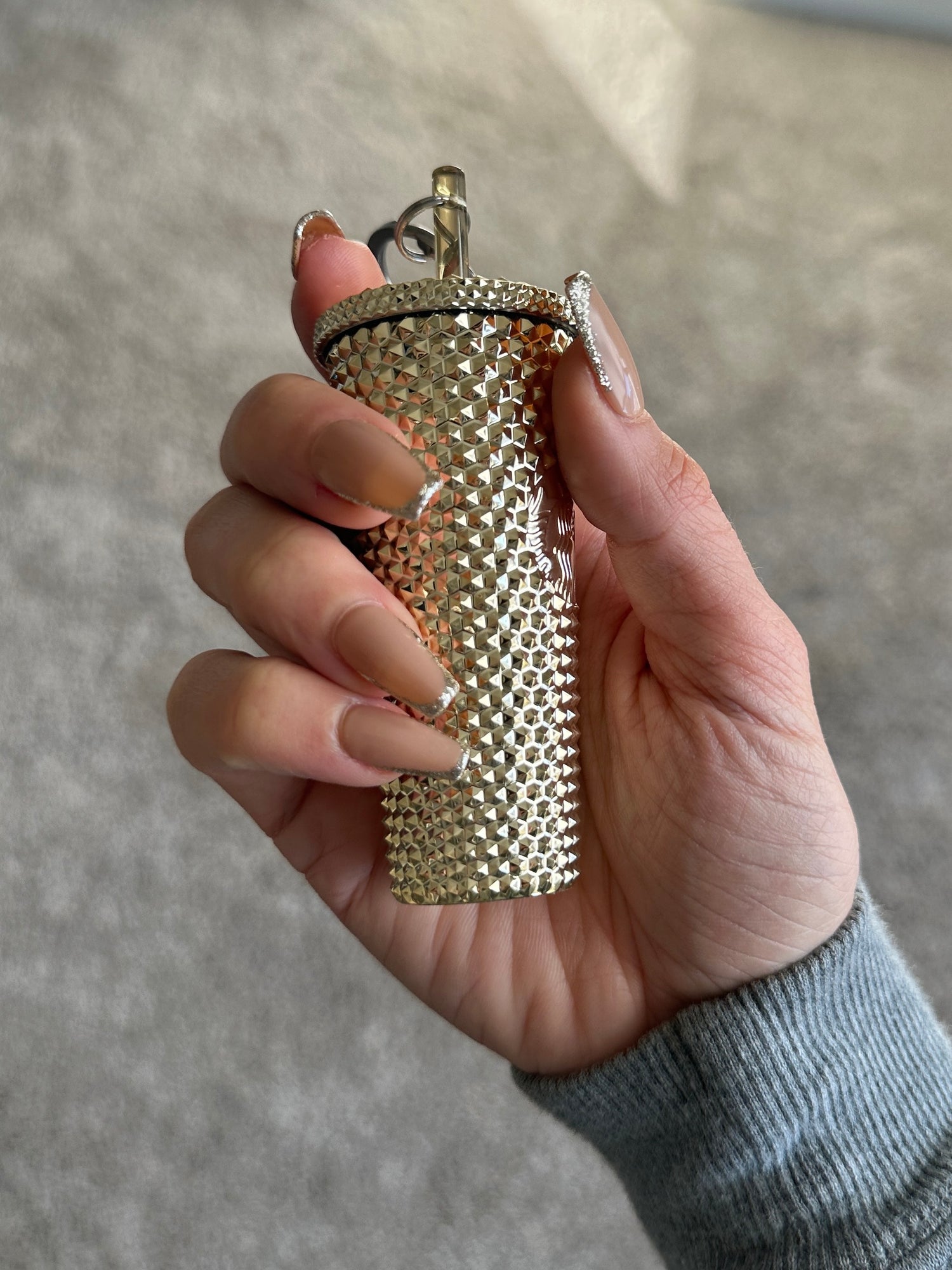 skinny french tips with silver glitter tips on a short coffin nail shape. beauty by hannalee press on nails.