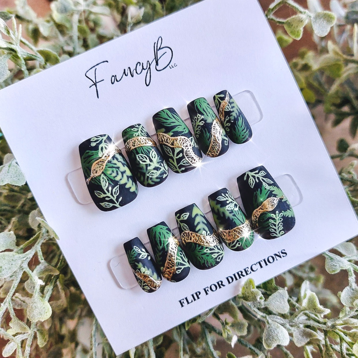 Custom jungle nails with gold snake, leafy forest nails. FancyB Custom nails.