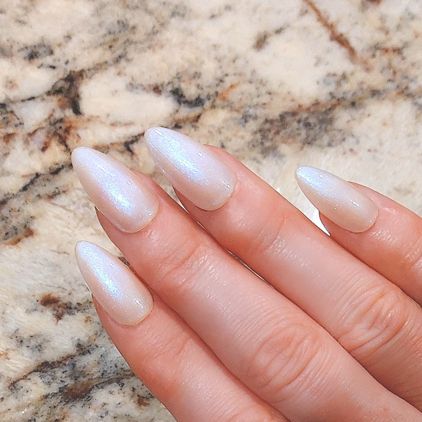 Hailey Beiber Pink Neochrome Pearlescent Glazed Donut Press on Nails in Short Almond, Medium Almond