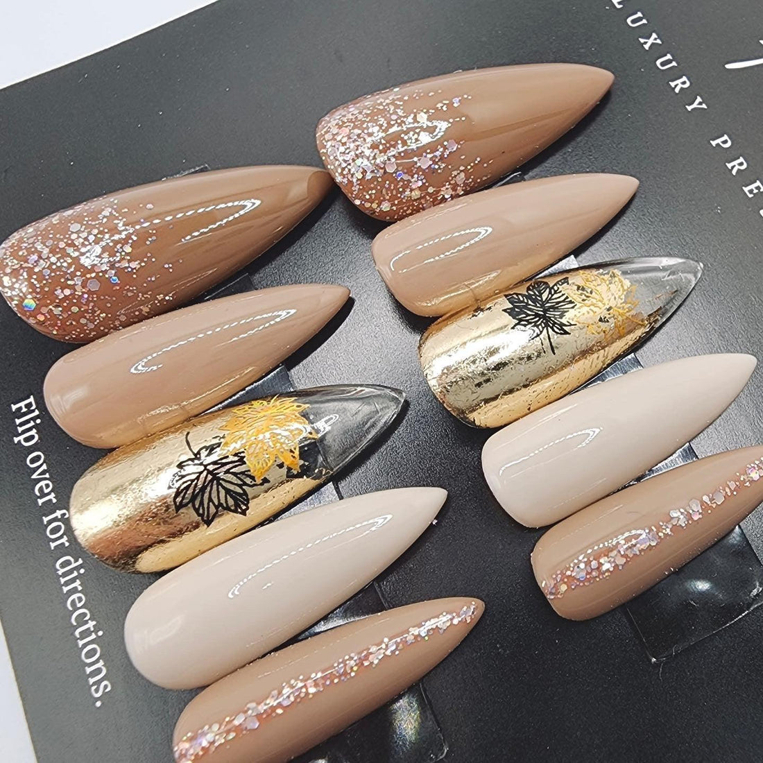 Fall leaves, gold foil, nude colors and glitter. Perfect press on nails for fall.