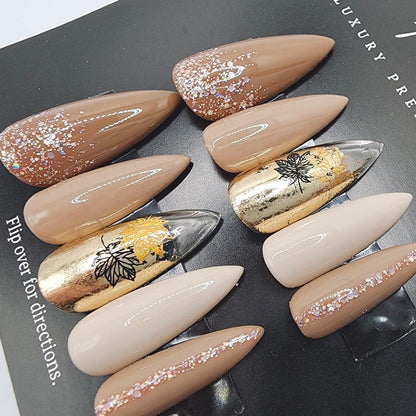 Fall leaves, gold foil, nude colors and glitter. Perfect press on nails for fall.
